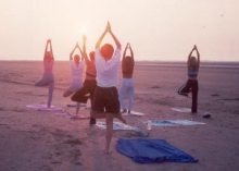 Yoga class from Prime Time Fitness, located in Sullivans Island SC cottage.